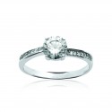 Solitaire accompagné argent massif rhodié pierres en zirconium blanc